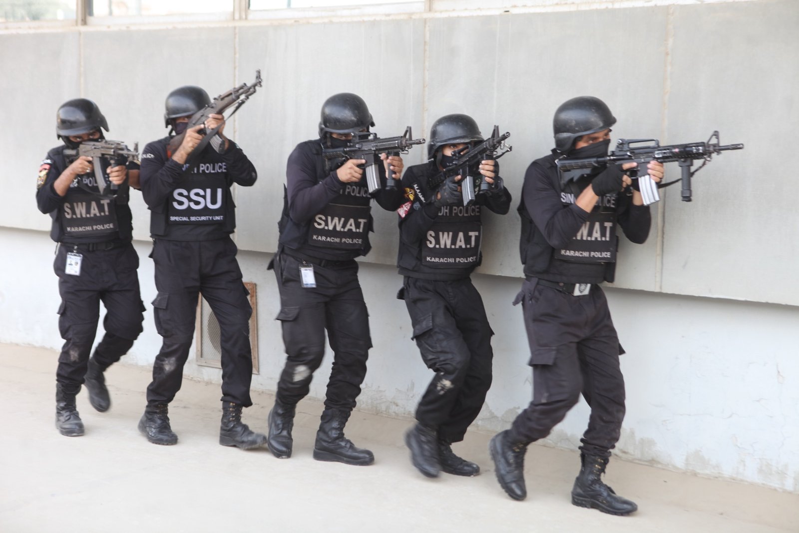 SSU officers standing at recruitment wall